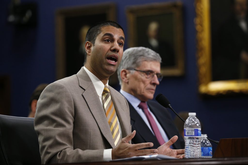 Then-FCC Commissioner Ajit Pai (L) testifies at a House Appropriations Financial Services and General Government Subcommittee hearing on Capitol Hill in 2015. Photo by Kevin Lamarque/Reuters